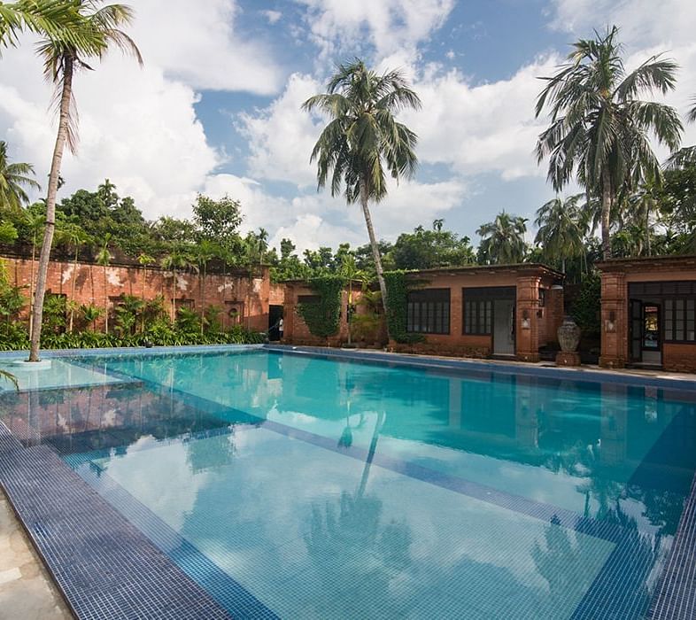 A swimming pool at The Rajbari Bawali