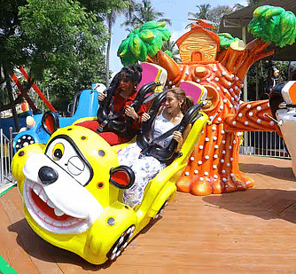 An animal shaped ride in a children's park