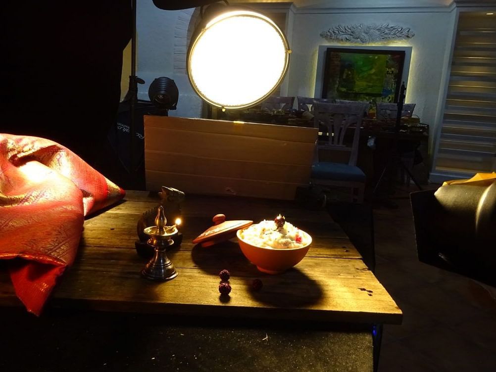 Food dish placed under a spotlight for styling and photography.