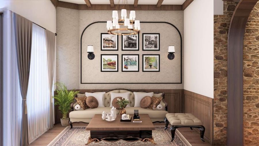 Living area with exposed wooden beams, a picture gallery wall, and a stone accent column at BluSalzz Terrah Hills Resort, Dalhousie.