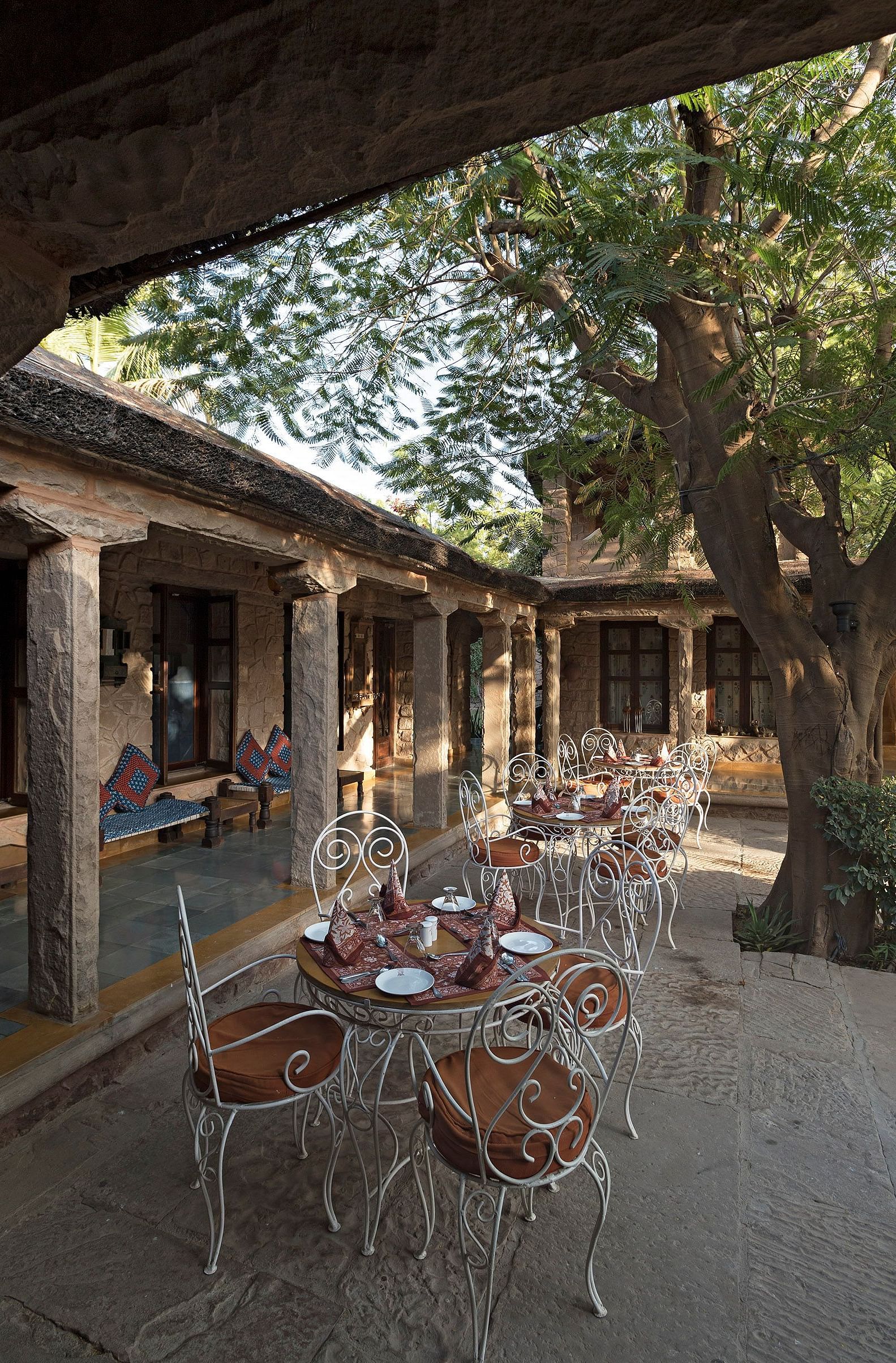 An image of the outdoor seating arrangement of the Taasli Restaurant at Manvar Shergarh - Manvar Resort & Desert Camp