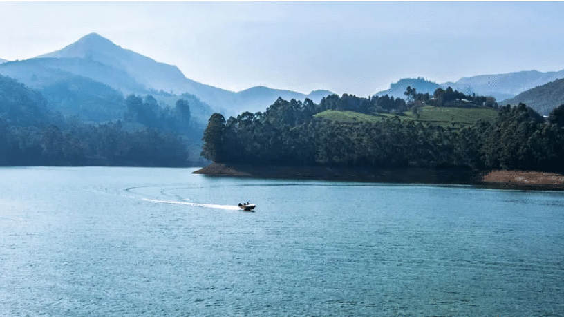  Mattupetty Echo Point and Kundala Dam, where the water is surrounded by mountains and morning mist.