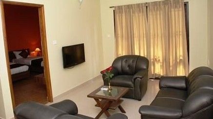 Hotel Arama Suites Bangalore living   bedroom area aqua suite hotel arama suites bangalore
