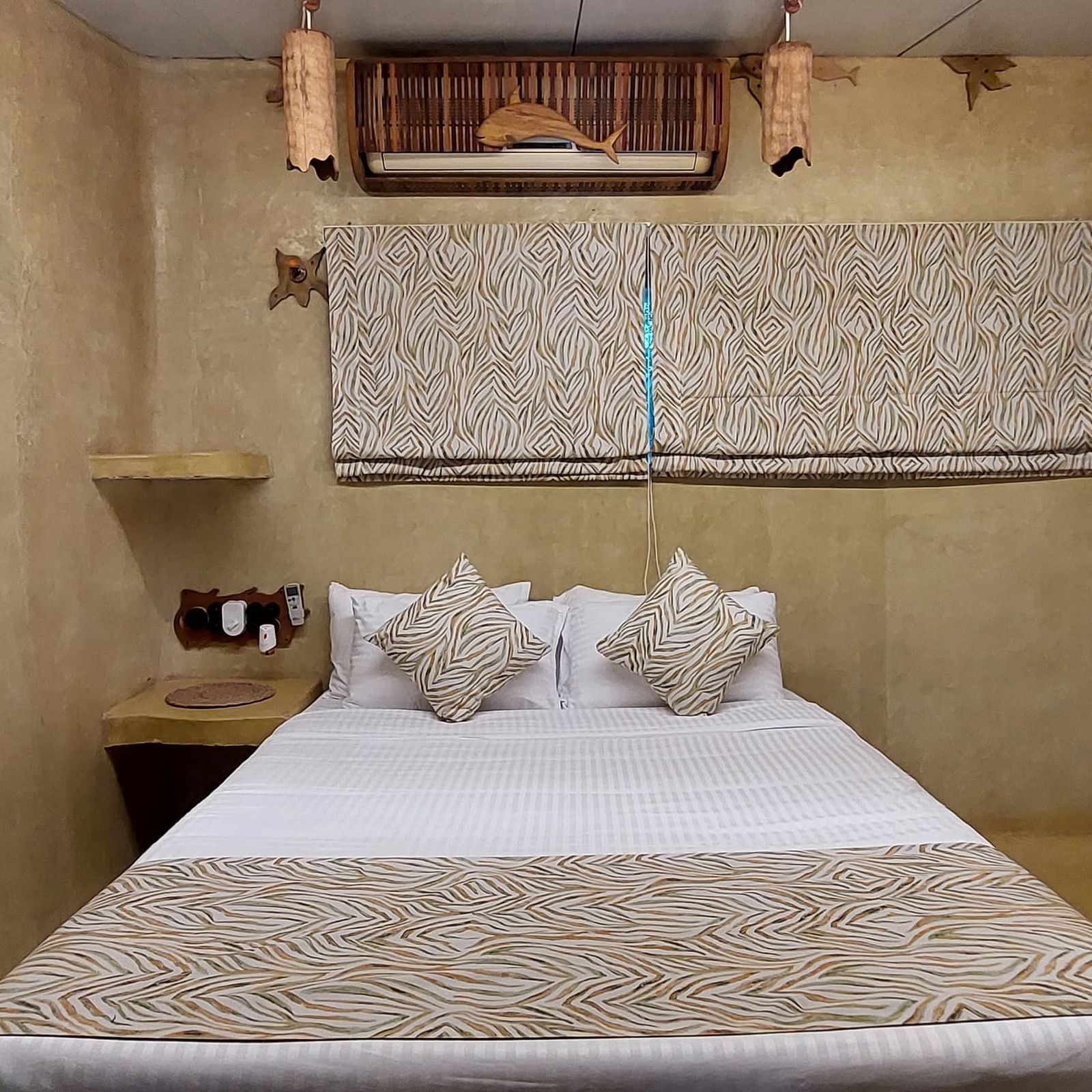 Bed with bedding in the room | Matsya Island Retreat