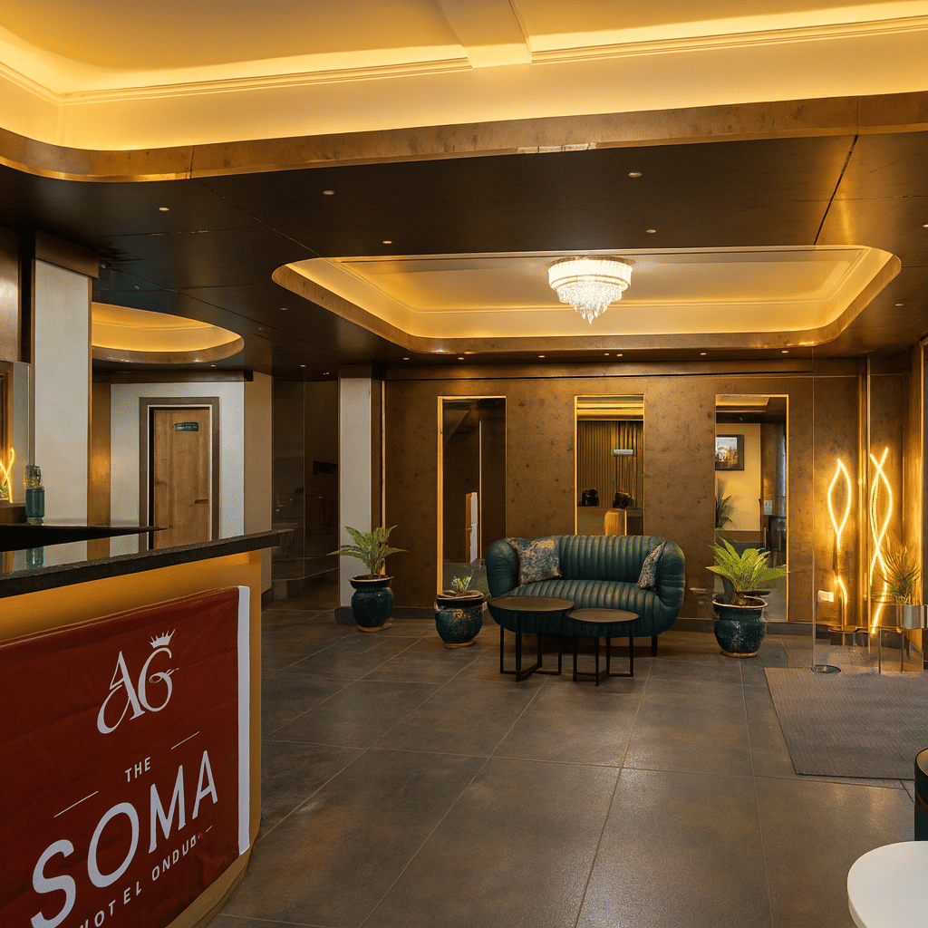 Luxury hotel lobby and reception area in Darjeeling with chandelier lighting, modern seating, elegant interiors, and large window showcasing panoramic mountain views