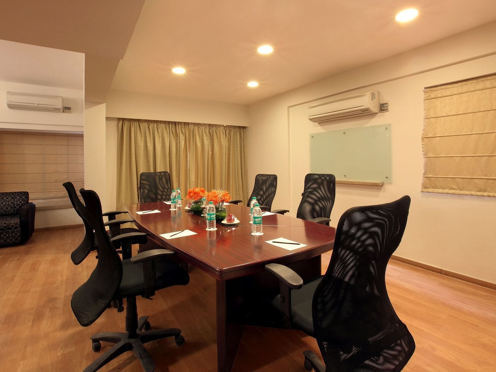 Seating arrangement in the boardroom at Starlit Suites, Bangalore