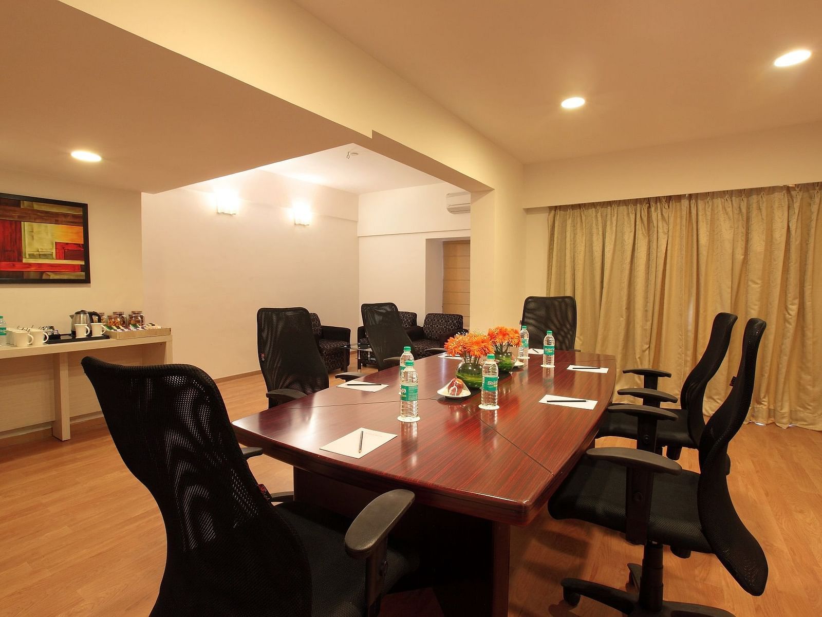 Seating arrangement in the boardroom at Starlit Suites, Bangalore