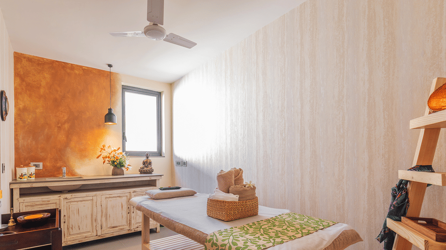 A spa room featuring all the necessary items required for a session or treatment - Karma Lakelands.