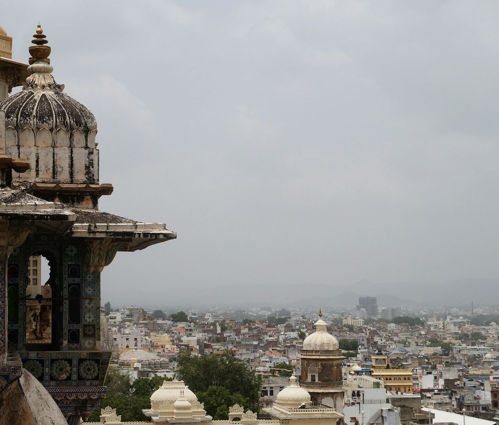 image of an old building with a city view