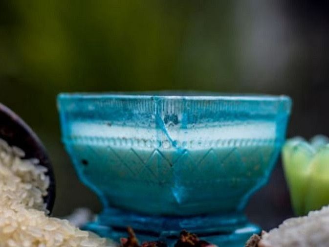 A close-up of a blue ceramic bowl used for wellness treatments at YO1, Catskills, New York.