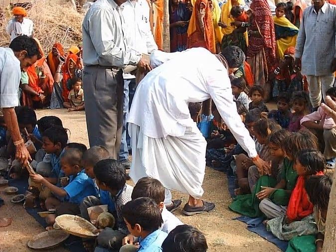 Community gathering under a tree