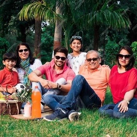 Family enjoying Picnic Amongst Nature