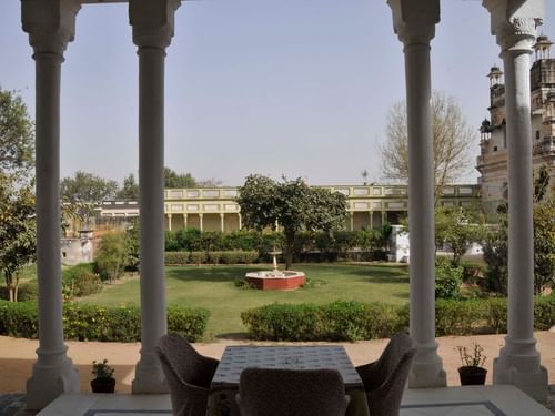 view of the lush lawn and water feature at The Piramal Haveli - 20th Century, Shekhavati