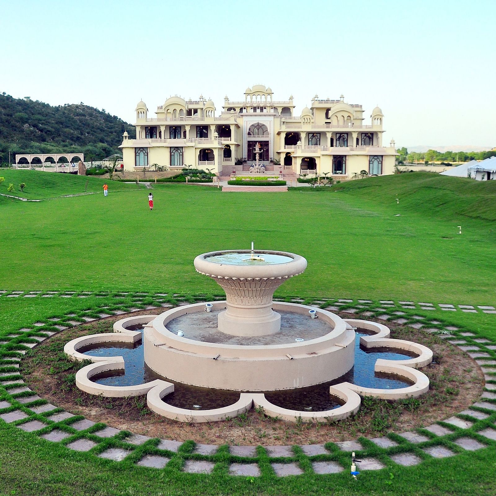 An overview of Moriyo Lawn with a water fountain at Rajasthali Resort & Spa Jaipur.