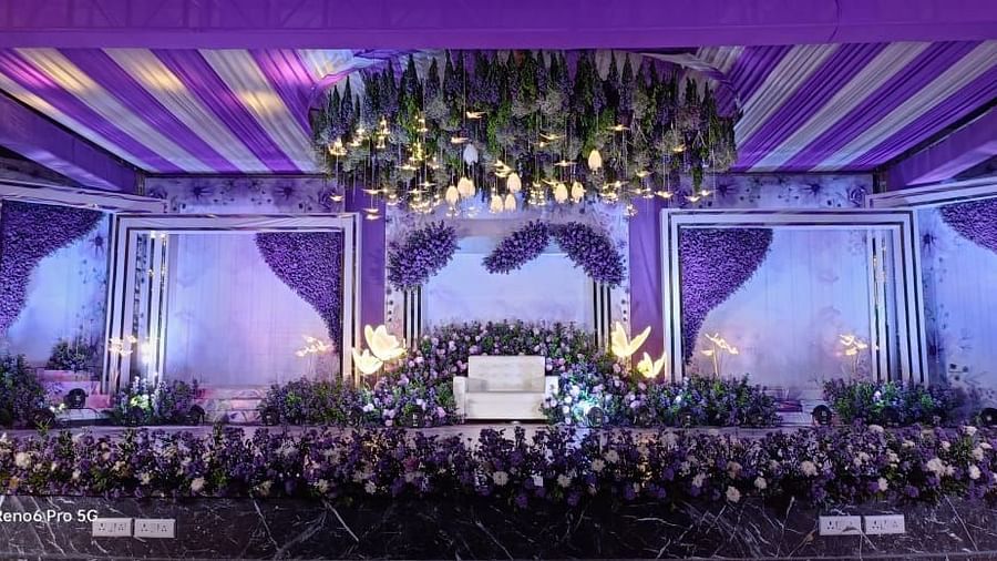 Lavish floral arrangement on stage with vibrant decor at VRR Astoria Hotel and Convention Centre