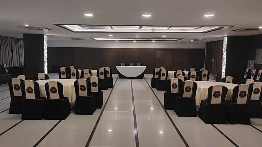 A collage image of the suhani hall showcasing the seating arrangements from the front and the bcak of the room | Yashshree Milestone, Siliguri