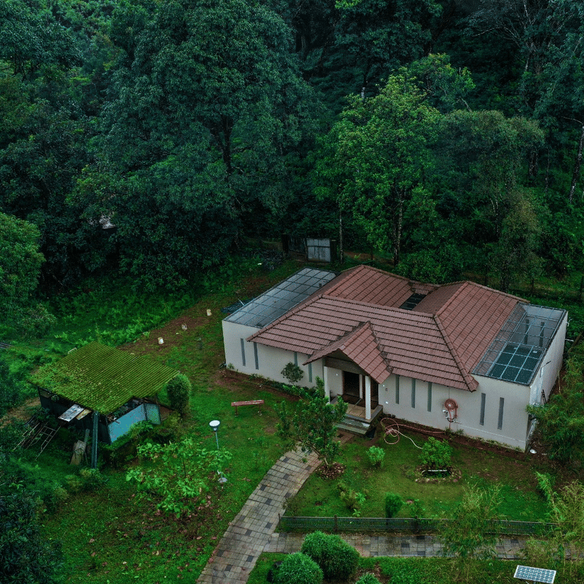 An aerial view of the Private pool villa that is surrounded by greenery - Abad Brookside Lakkidi, Wayanad