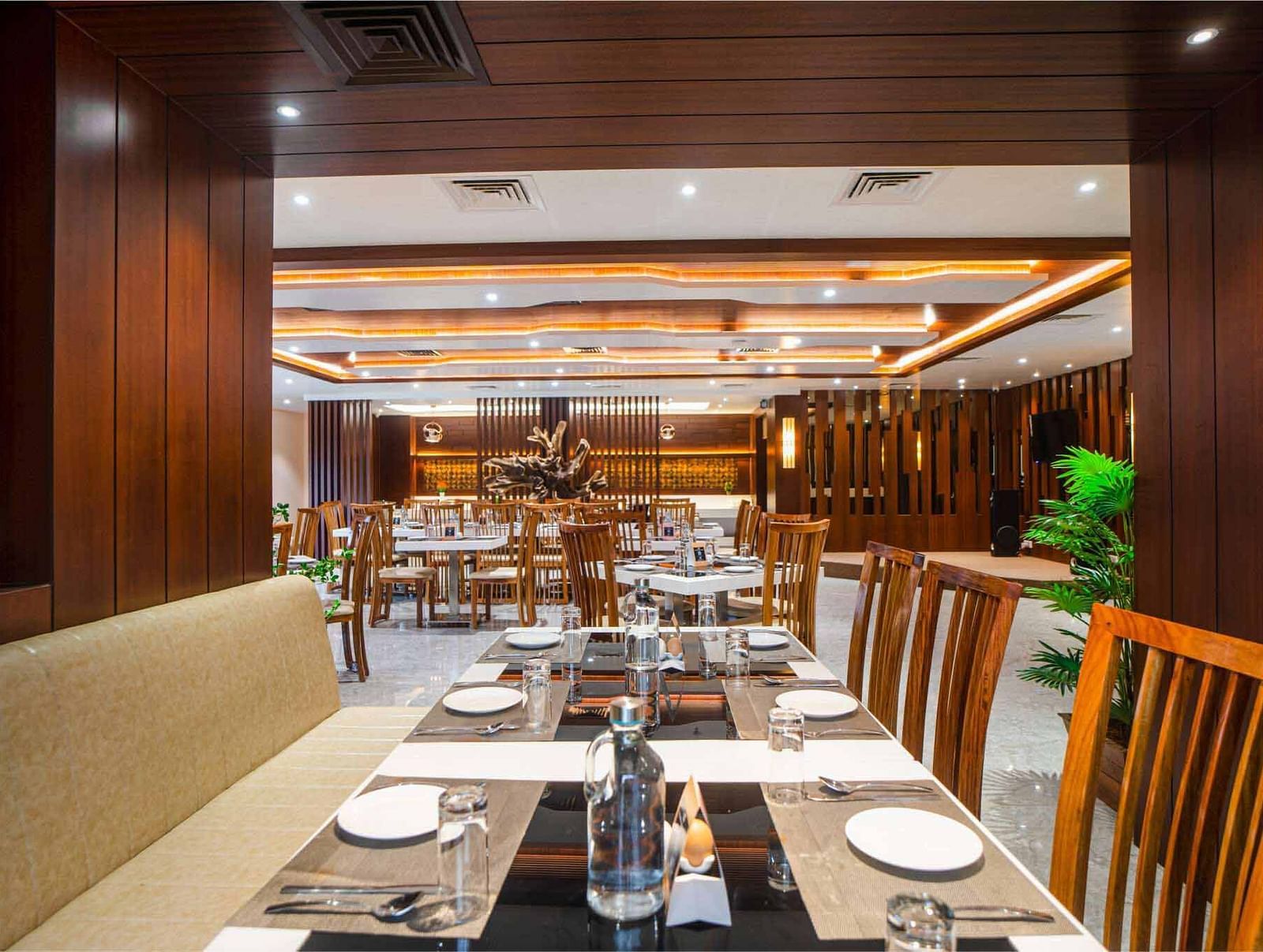 A neatly set table in the dining area of Mansha Palace in Port Blair is ready for guests.