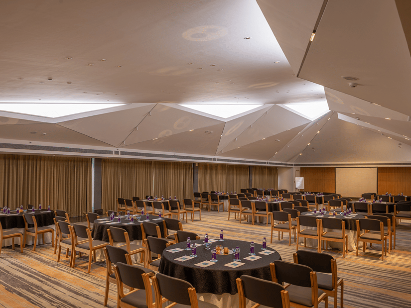 A cluster seating arrangement at Pavillion Hall of Keniworth Resort & Spa for a corporate offsite in Goa