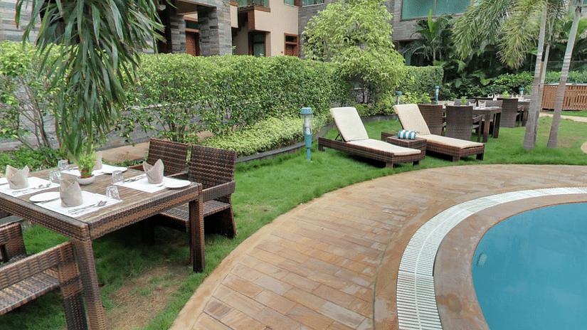 Lounge chairs by a swimming pool