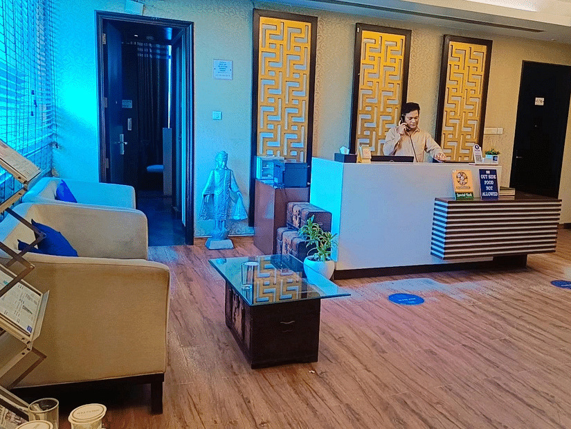 reception area of a hotel featuring a person standing at the counter -  Five Elements Hotels