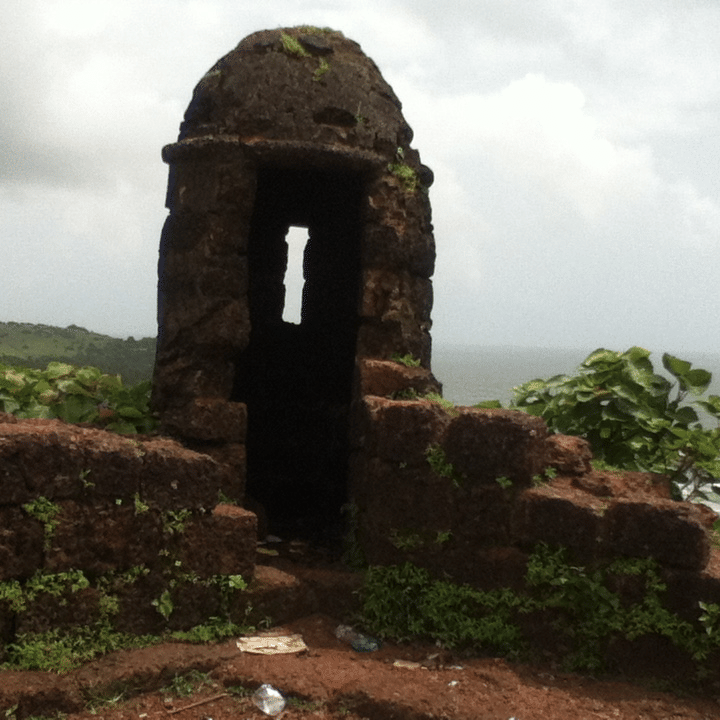 overview of Fort Chapora with dark skies in the background