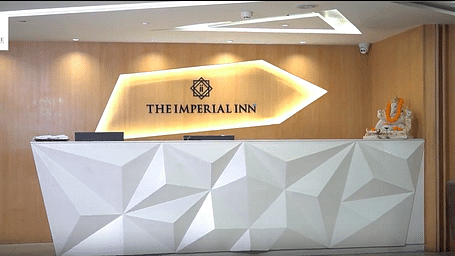 Image of a reception of Yashree Imperial inn with the name of hotel written on wall