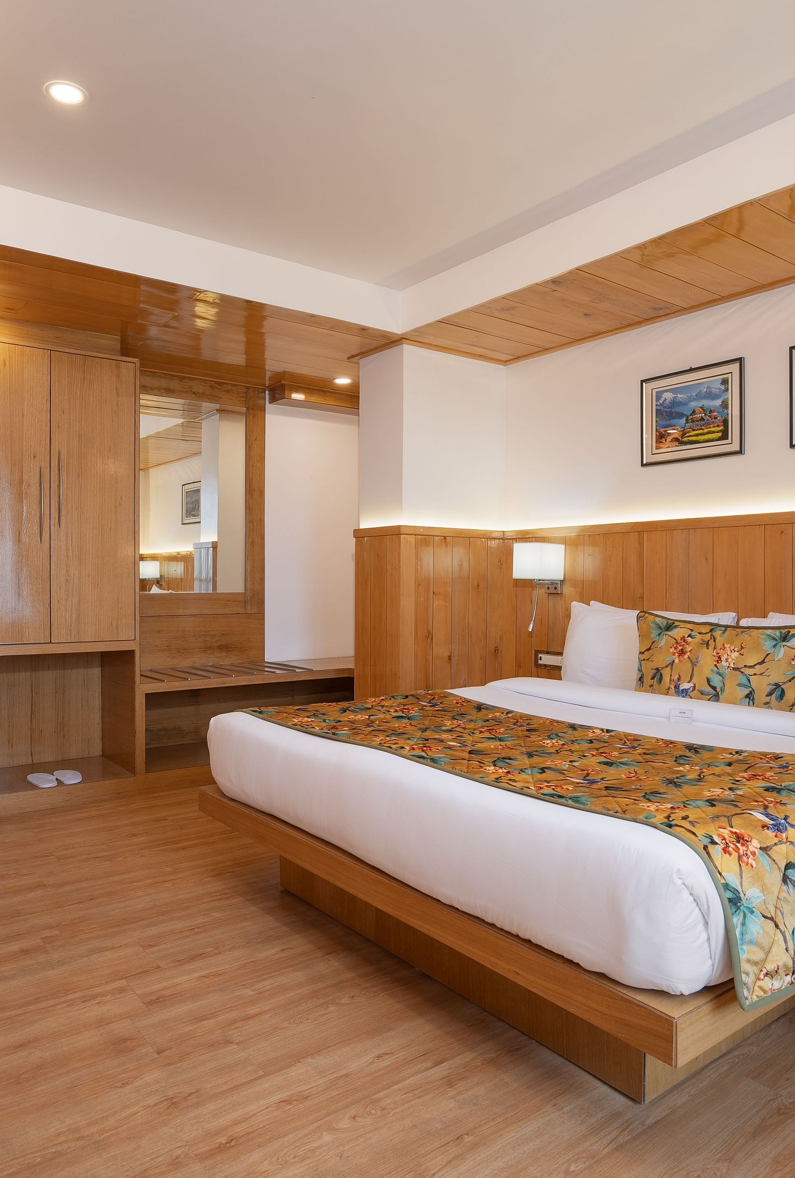 view of king size bed and TV of Deluxe room at Summit Grand Resort & Spa