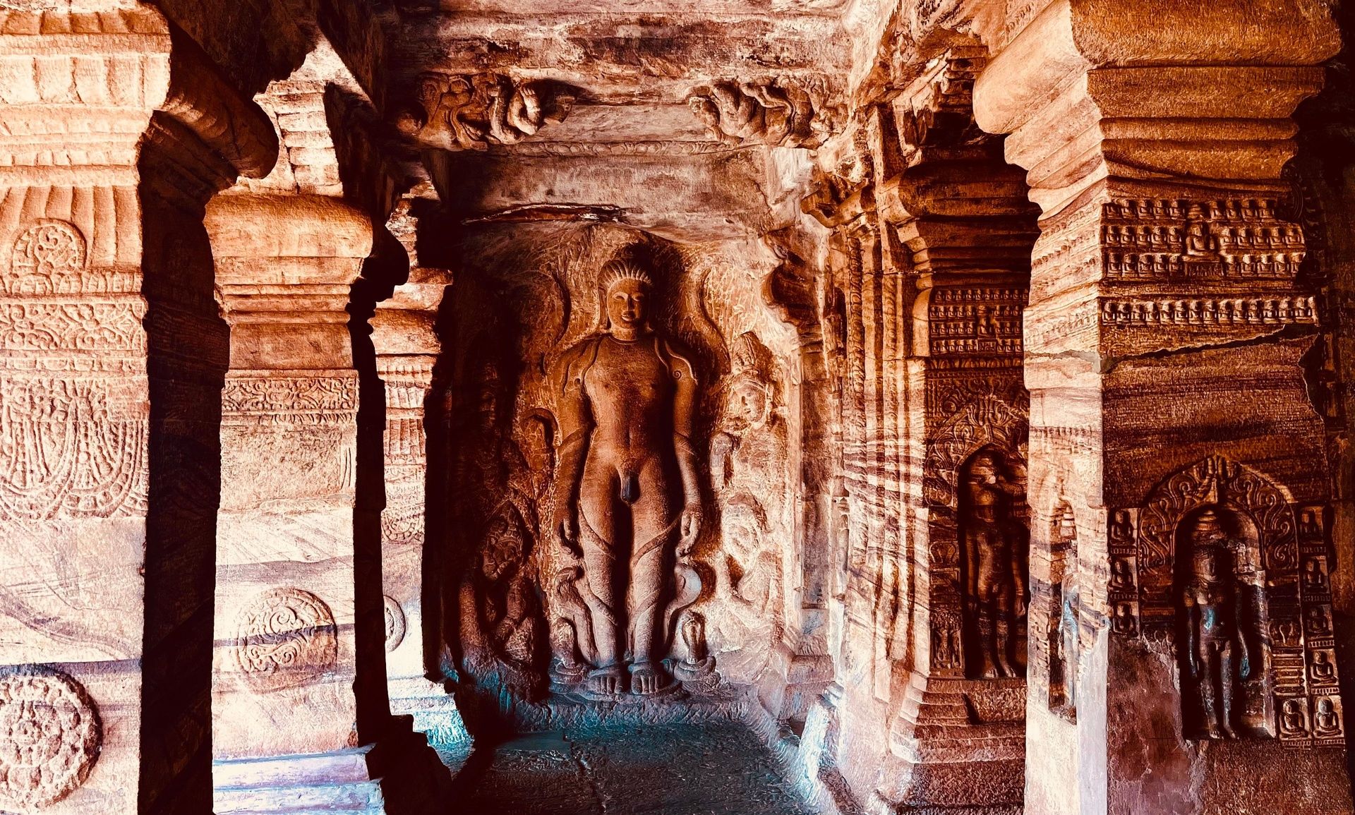 Badami Cave 4 Jain temple interior with sculpted figures.