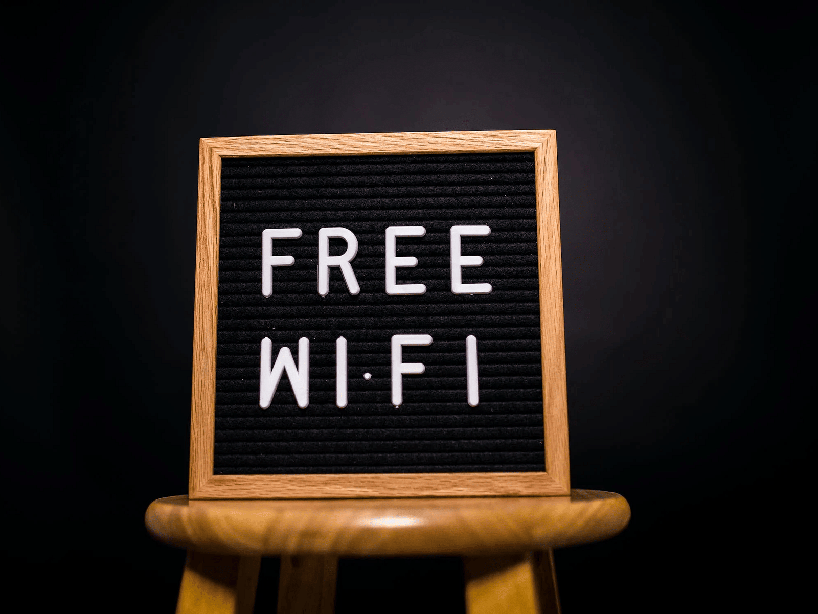 Board with free wifi written on it