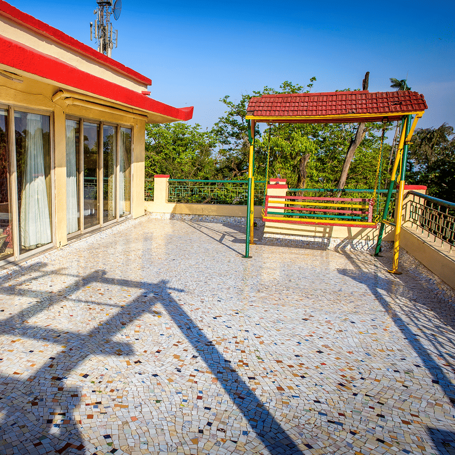 The terrace of the Royal Suite of the resort with a swing.