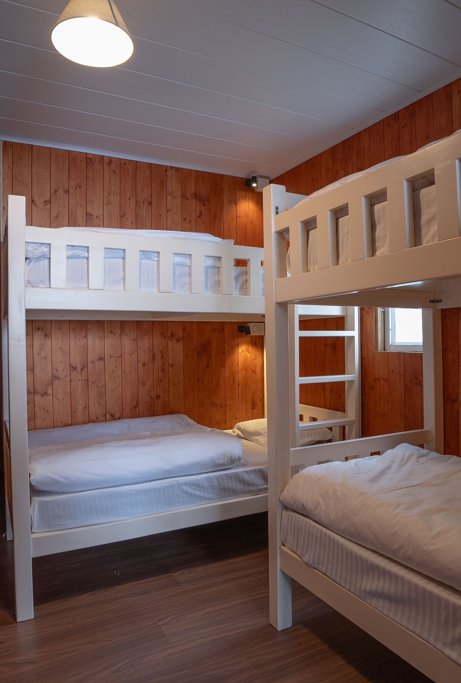 Bunk beds in a room at Poshtel, Meghma