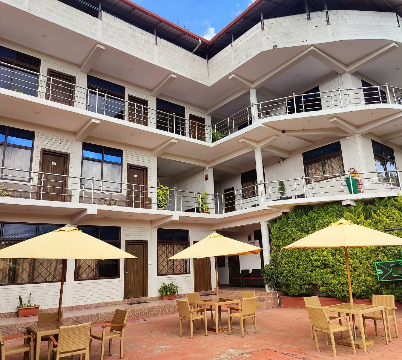 Facade of the resort with patios | Standard Room | Woodstock Resorts, Coorg