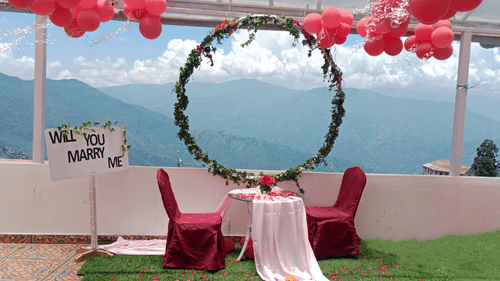 Beautifully decorated Mount View Haven with mountain backdrop and romantic seating arrangement