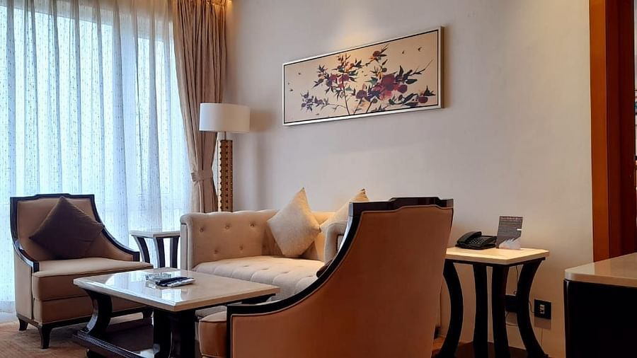 a view of the living room with comfortable sofas of C-Suite at Wonder country club resort
