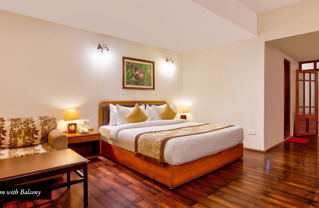 Family Suite with Sofa Cum bed with Balcony  at Summit Ttakshang Residency Hotel & Spa, Gangtok