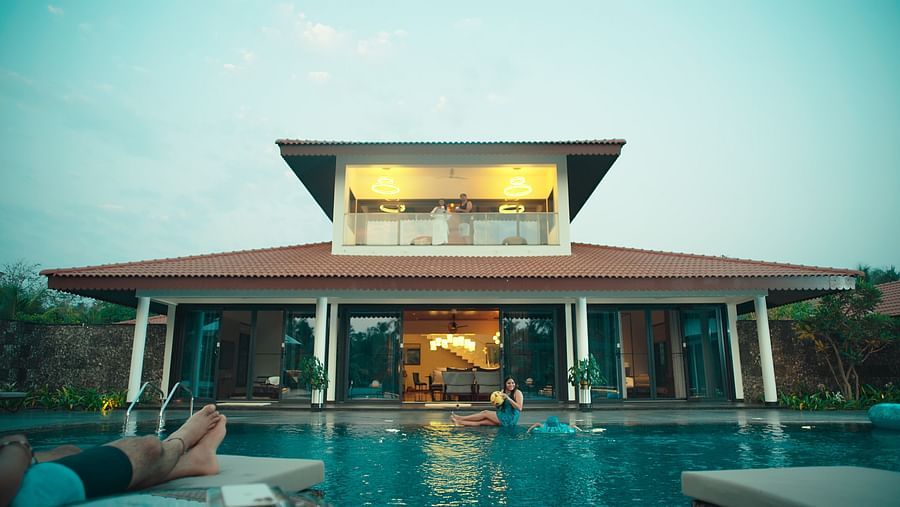 An overview of the interior facade with a swimming pool in the foreground - Gamyam Resort