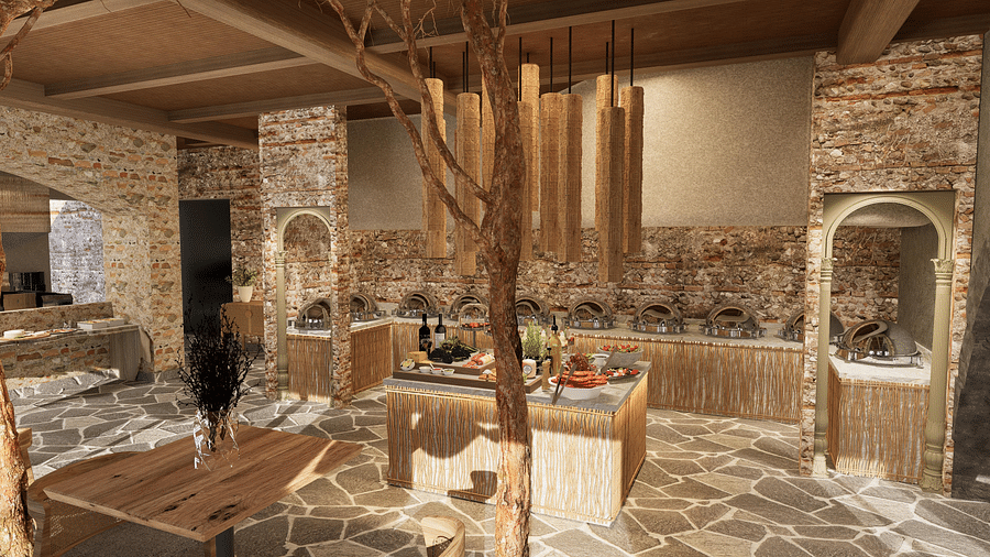 Elegant dining space with tables, chairs, and a chandelier suspended from the ceiling at The Evren, Vagator.