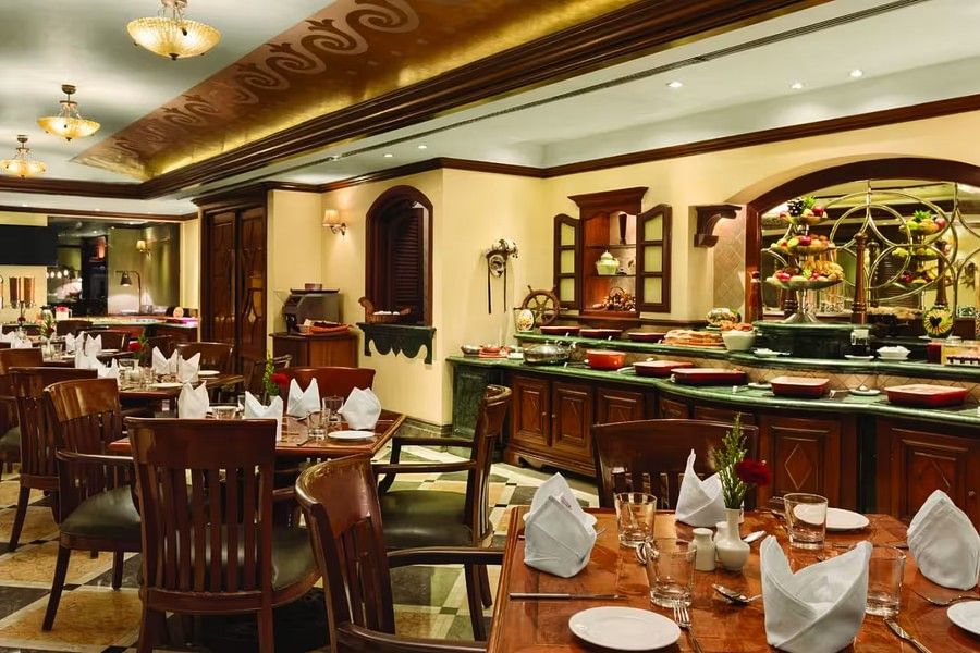 Tangerine Cafe at Hotel Ramada Plaza Palm Grove Juhu Beach Mumbai, 24 Hour Coffee Shop in Juhu Mumbai sadfk