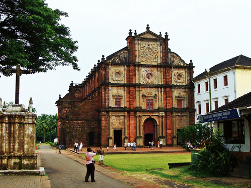 The exterior of the Basilica of Bom Jesus with a manicured garden in front of it. This church is one of the serene places to explore in South Goa.