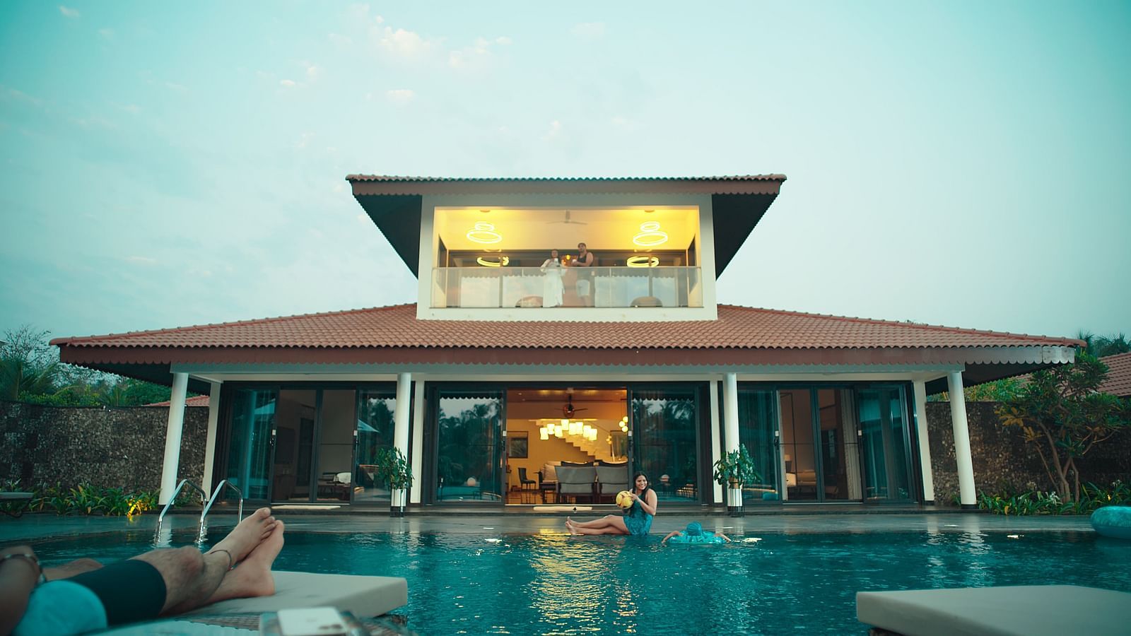 An overview of the interior facade with a swimming pool in the foreground - Gamyam Resort