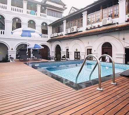 A swimming pool at The Old Courtyard Hotel