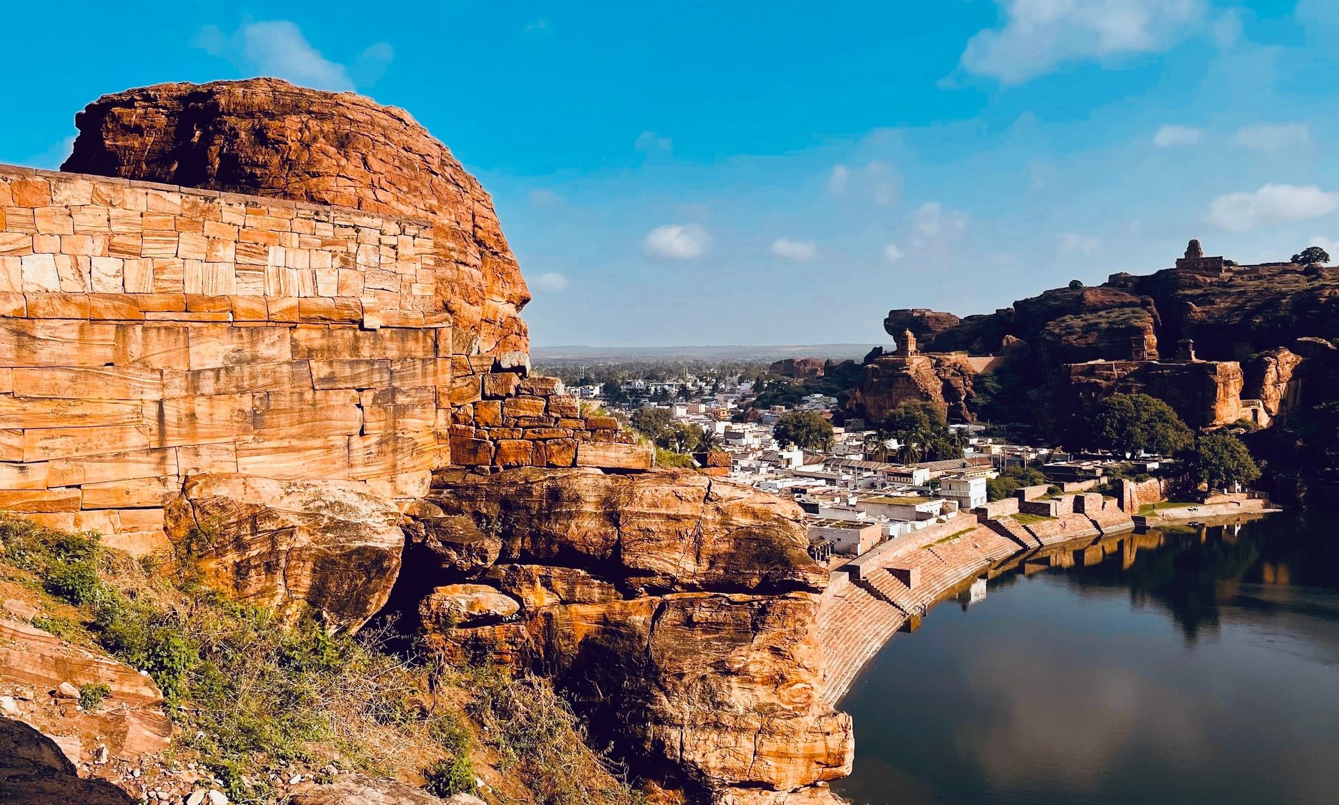 Badami Cave Temples by Agastya Lake in Karnataka.