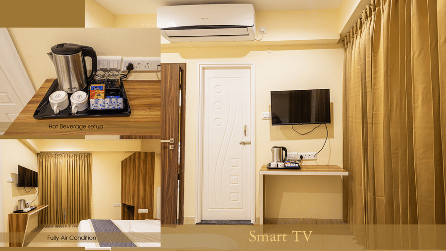 A hotel room view highlighting a smart TV and a coffee station on a desk - Urban Comforts