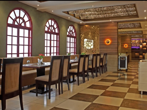 Restaurant with elegant chairs and floor to glass windows