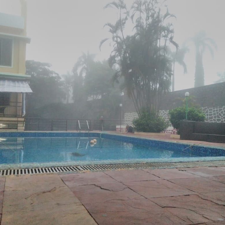 mist-covered view of the swimming pool - Zara's Resort 000