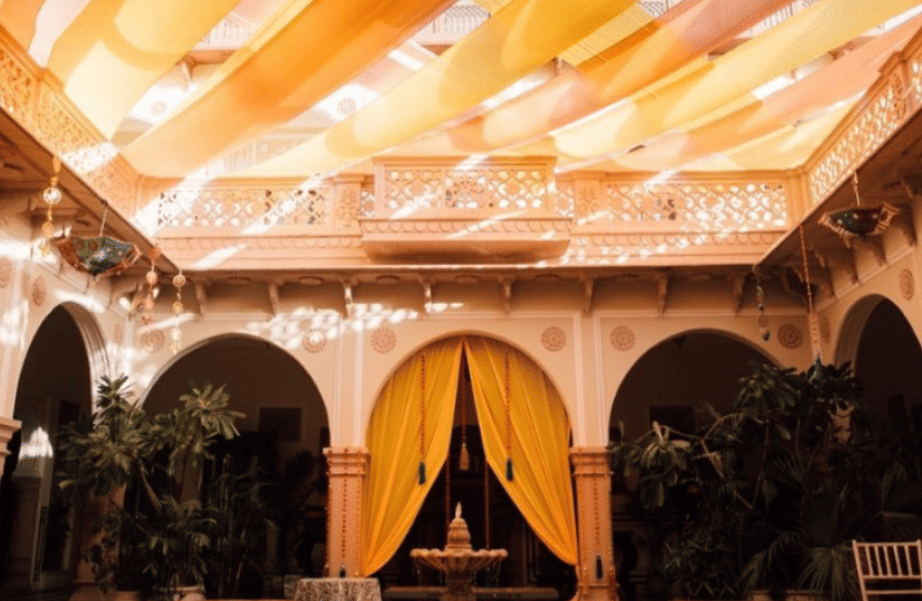 A vibrant canopy ceiling above a grand seating area, adding colour and charm to the ambience - Khas Bagh, Jaipur.