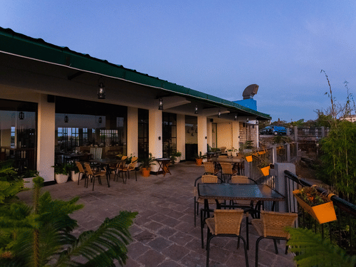the outside seating area of Sohra House