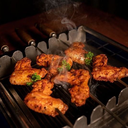 meat being grilled  on the barbecue 2