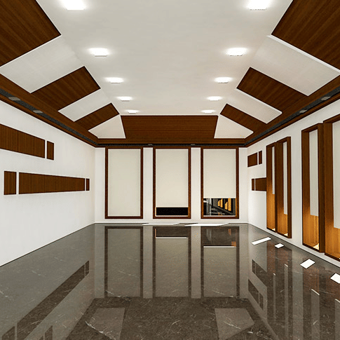 Cascade Hall at Uday Samudra Leisure Beach Hotel, Kovalam, features white walls, and a patterned ceiling under bright lighting